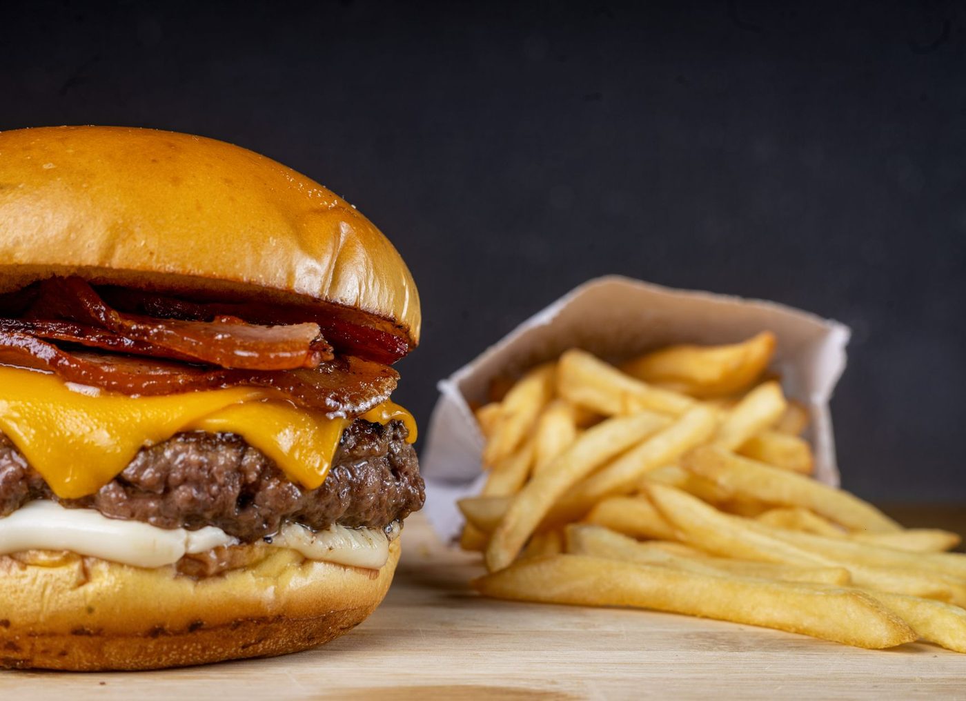 Smashed beef burger with melted cheddar and toasted potato bun